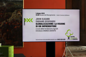 Foto del cartellone della conferenza "Globalizzazione: la visione di un imprenditore".